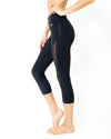 L'espace Low-Waisted Capri Leggings with Mesh Panels and Reflective Strips - Savoy Active